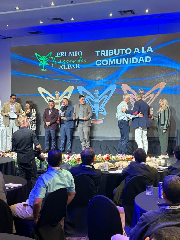 simposio alpar crossing world group premiso trascender 2025 tributo comunitario